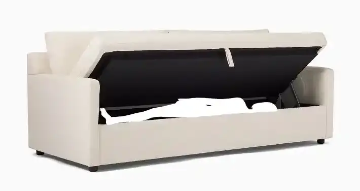 The storage couch opens and there's a sex doll hidden inside.