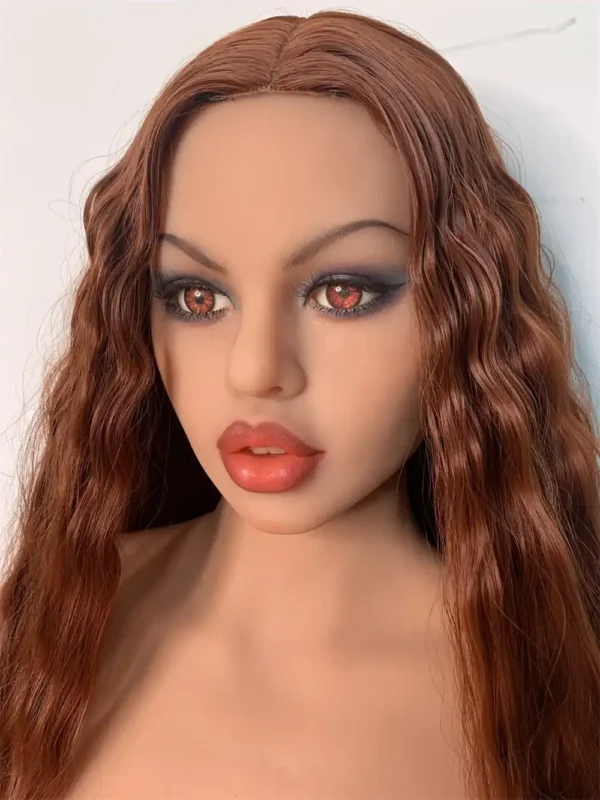 A sex doll with red hair and big round earrings.